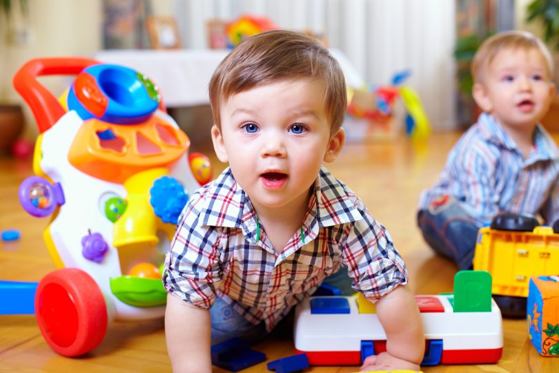 Grade Club infant crawling toward the camera during floor play